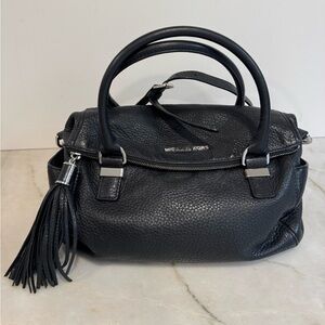 Black leather Michael kors tassel flap purse excellent condition